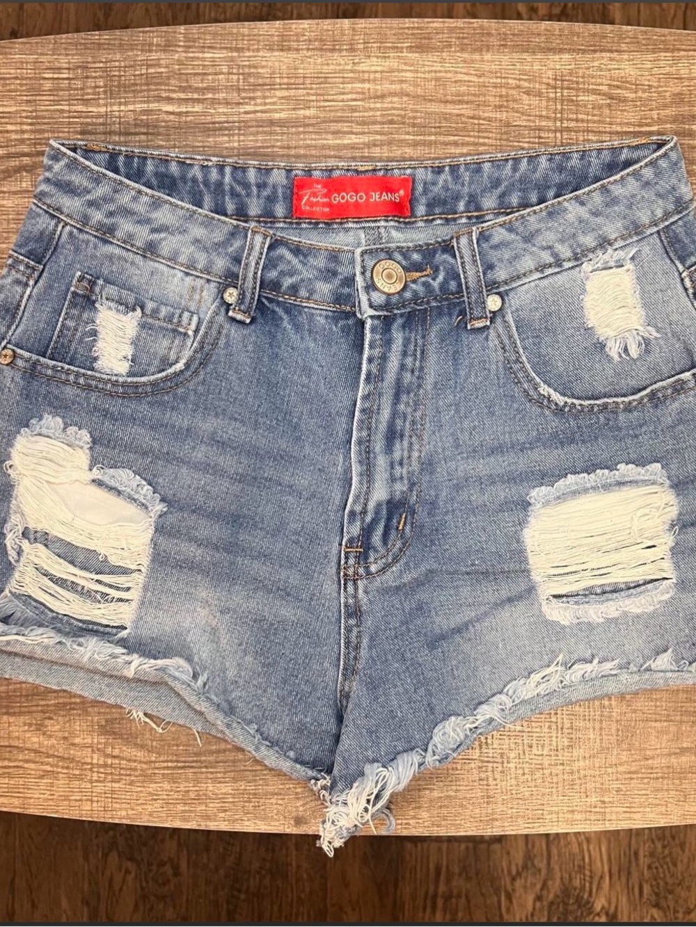 GOGO Women's Light Blue Distressed Denim Cutoff Shorts